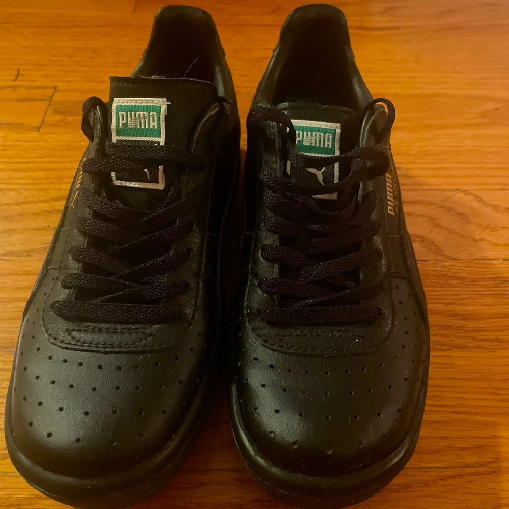 Never worn - Puma GV Sneakers- Kids Size 4 or Size 6 women.
